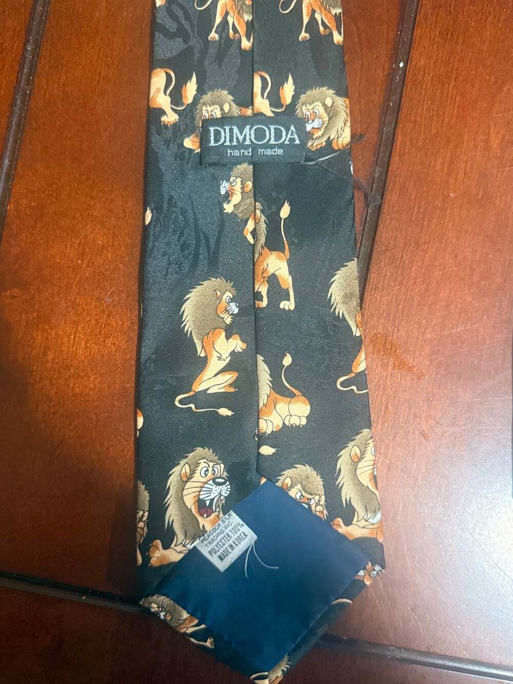 Dimoda Hand Made Novelty Necktie Black with Cartoon Lions Print
